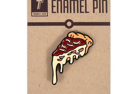 A enamel pin of a deep dish pizza on a brown cardboard backing.