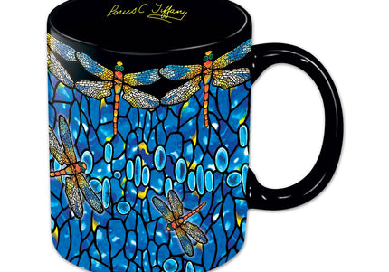 A black porcelain mug with a vibrant pattern of lace-winged dragonflies and blue oval jewels.
