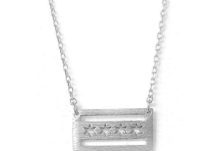 A silver necklace featuring a pendant with the Chicago flag design on a white background.