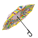 A light colorful, geometric patterned, reversible umbrella inspired by Frank Lloyd Wright.