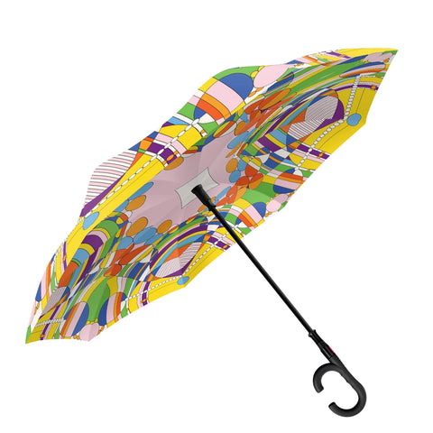 A light colorful, geometric patterned, reversible umbrella inspired by Frank Lloyd Wright.
