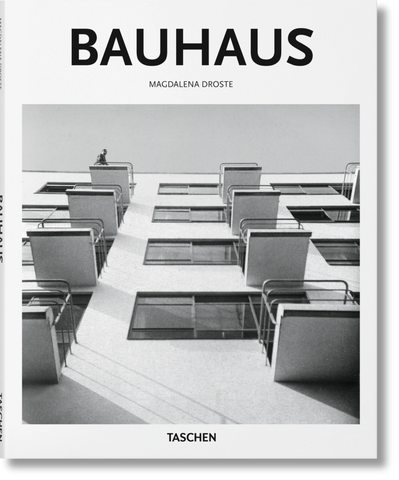 Cover of the book 'BAUHAUS' by Magdalena Droste, featuring a black and white photograph of a Bauhaus-style apartment building.