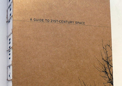 Brown paper cover book with small black text and title Camps.