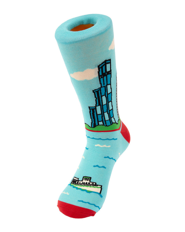 Light blue sock with a cityscape design