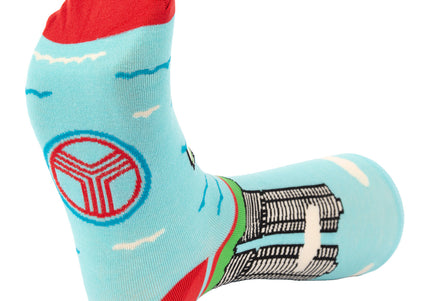 Light blue sock with geometric design on the foot