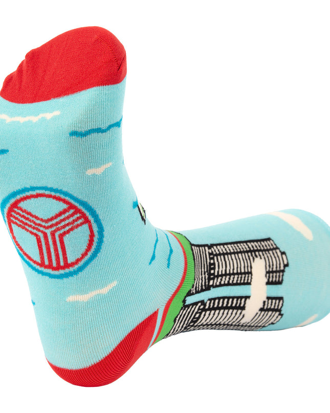 Light blue sock with geometric design on the foot