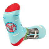 Light blue sock with geometric design on the foot
