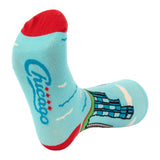 Light blue sock with red accents and 'Chicago' text on bottom of foot