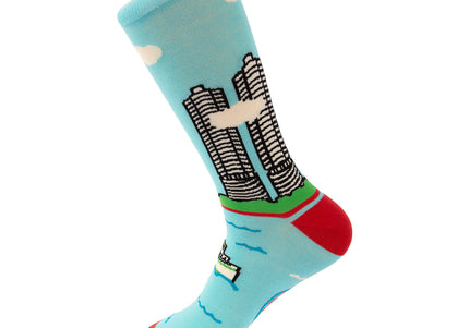 Colorful sock with cityscape design on a light blue background