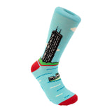 Sock with a design of a building and landscape on a light blue background