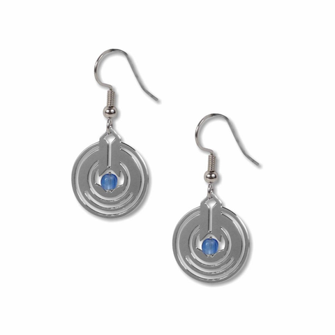 A pair of silver-colored earrings with blue glass beads, designed by Frank Lloyd Wright.