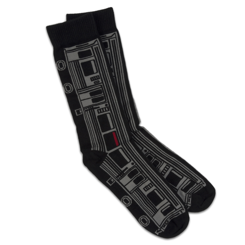 A pair of black socks featuring a design of a grey "L" train car.