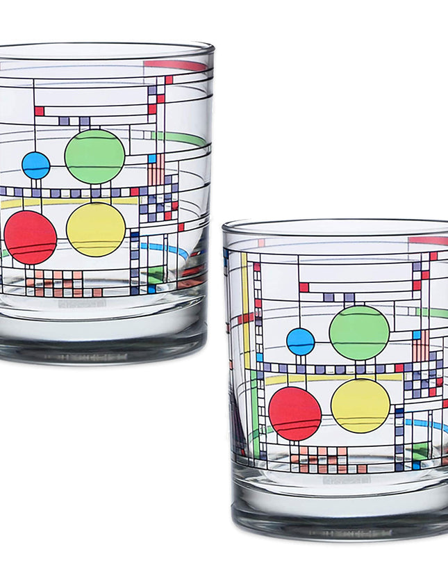 A set of two clear double old-fashioned glasses with a geometric pattern inspired by Frank Lloyd Wright's design from the Coonley Playhouse.
